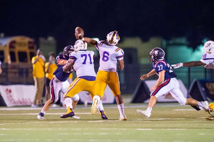 Danny Lewis throws a pass as Westgate takes on Teurlings Catholic.